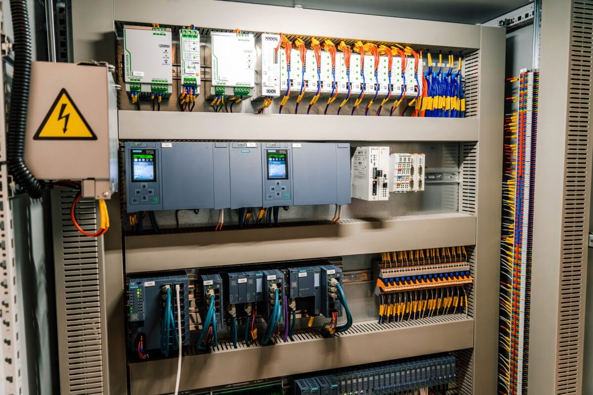 Industrial control panel with I/O wiring and electronic modules